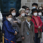 Νοτιοκορεάτες με μάσκες/ apimages