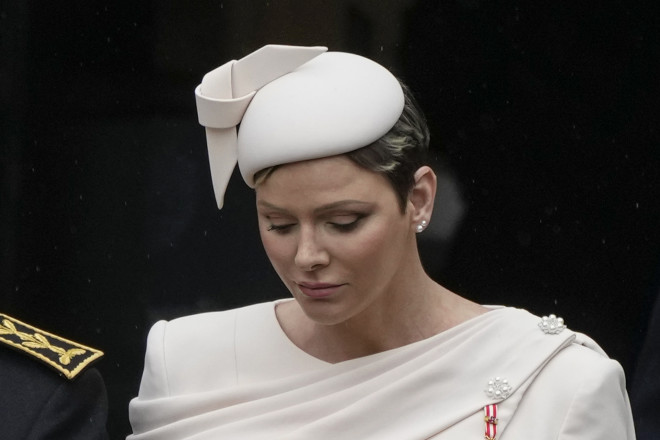  Απλό αλλά σικ΄λατο ήταν και το καπέλο της Σαρλίν (AP Photo/Alessandra Tarantino)