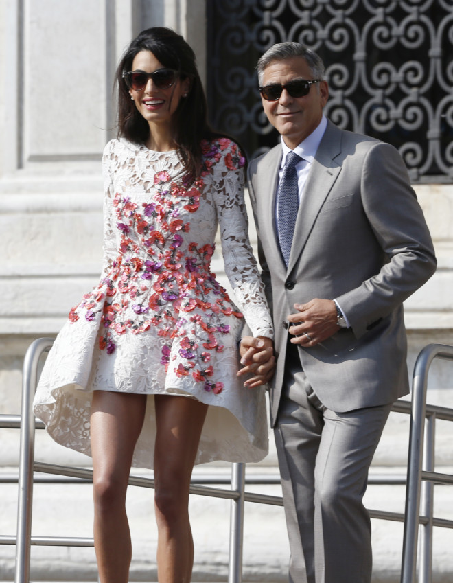 George Clooney - Αmal Αlamuddin κατά την αναχώρησή τους από τη Βενετία, όπου έγινε ο γάμος τους (AP Photo/Luca Bruno)