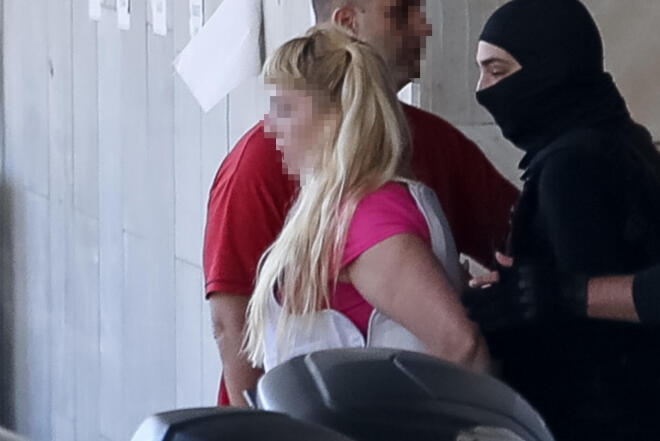 Στα δικαστήρια της πρώην σχολής Ευελπίδων έφτασε η 46χρονη που κατηγορείται για τον εμπρησμό στη Marfin το 2020 - Eurokinissi